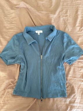 Women’s Light Blue top with zip up and collar